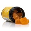 Ecommerce style image of mango flavored nirvana cannabinoid blend blend gummies, on side spilled