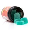 Ecommerce style image of fruit punch flavored HHC cannabinoid gummies, on side spilled