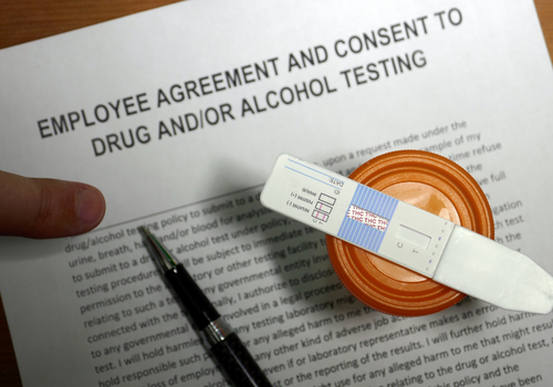 Drug test and a contract stating employee drug testing policy